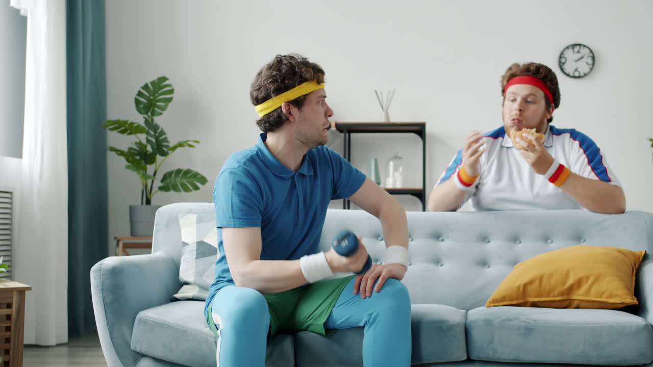 Friends Exercising and Eating on the Couch