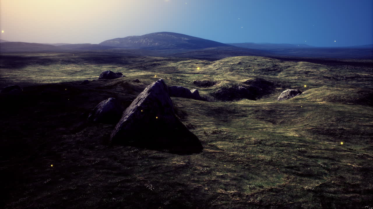 Vast rocky landscape under twilight sky with distant mountains in view