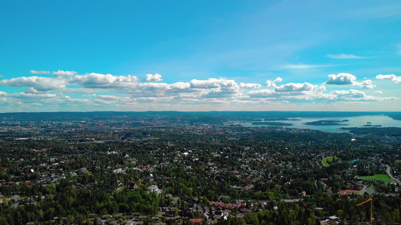 Aerial panning across Oslo city