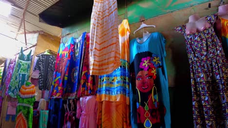 colorful african dresses at a market