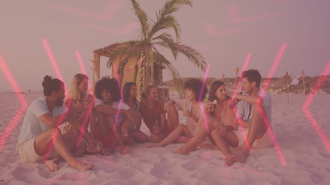 On beach, friends sitting with pink light animation creating vibrant scene