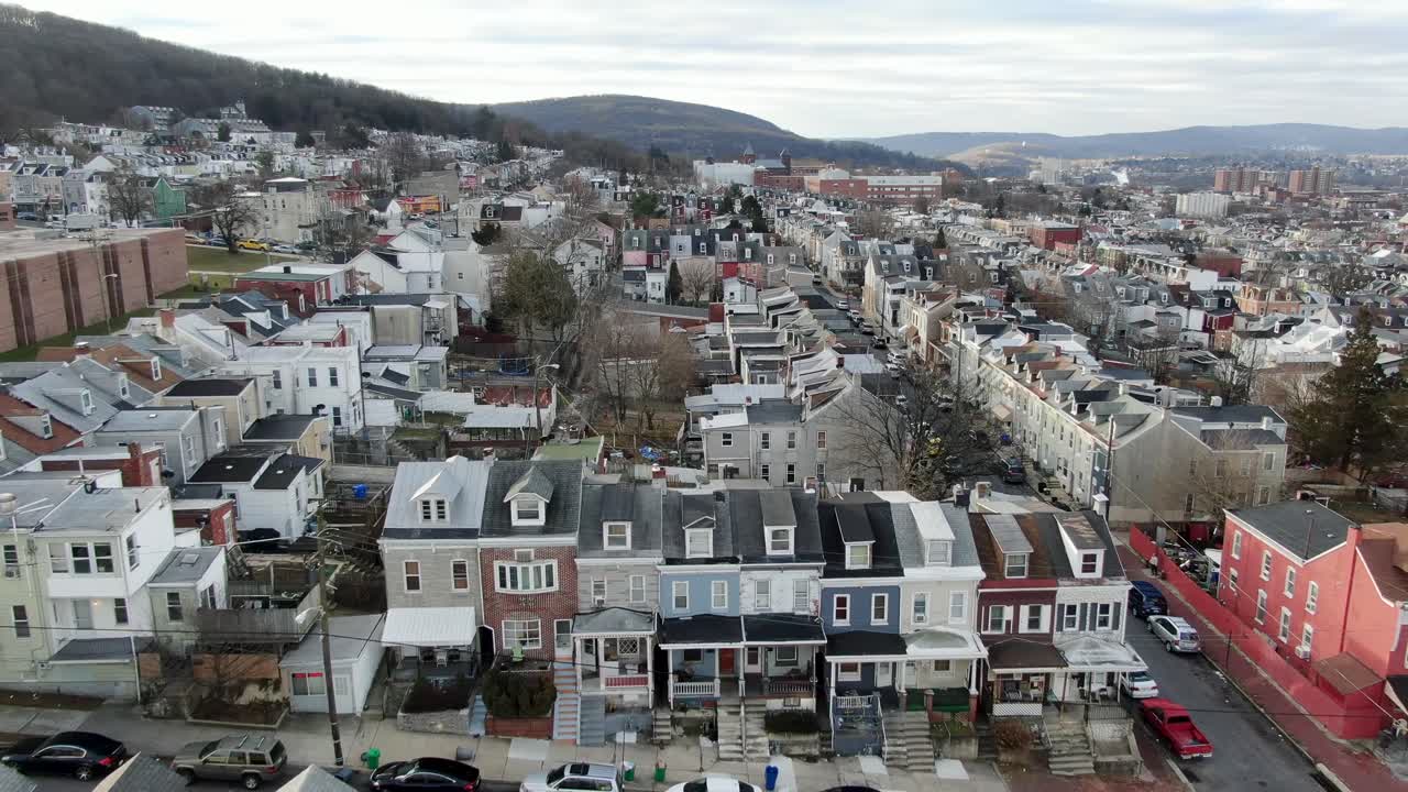 Urban city residential housing district in inner city USA, American neighborhood poor community aerial footage, poverty and immigrant minority population theme