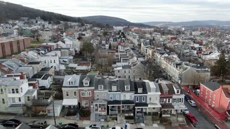 urban city residential housing district in inner city usa, american neighborhood poor community aerial footage, poverty and immigrant minority population theme