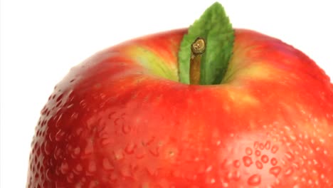 Wet-red-apple-rotating-