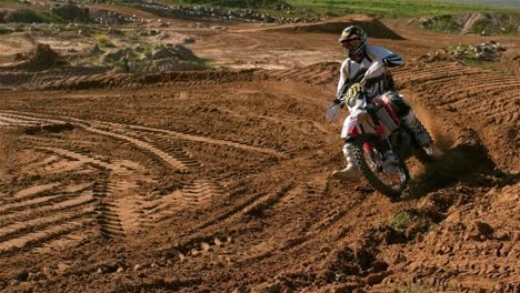 man riding a motor cross bike