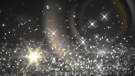 animación de luces brillantes que caen sobre un fondo oscuro