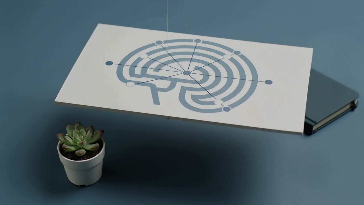Lifting brain maze board tilting above blue table, as thin lines moving, succulent