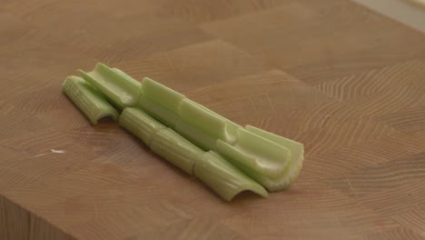 removing-the-celery-stalks-from-the-cutting-board