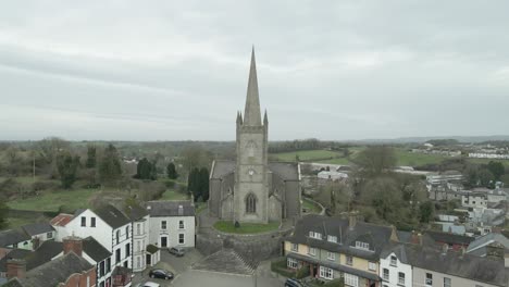 clones town with historic church, county monaghan, ireland, overcast day, aerial view