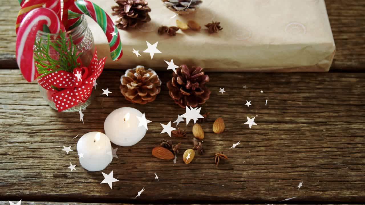 Confetti stars drifting across table, showing candy cane jar, flickering candles glowing