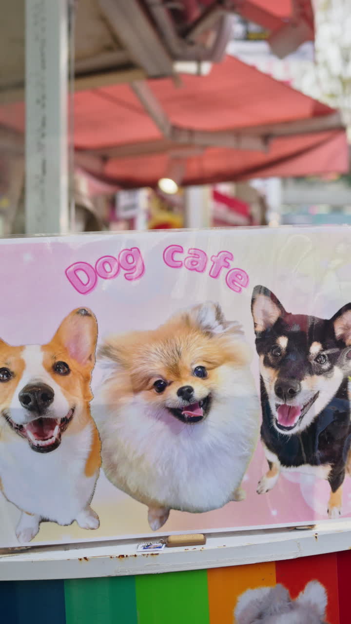 Tokyo, Japan - April 24 2025: Signboard featuring famous symbols of Japanese culture on the Takeshita shopping street. Vertical