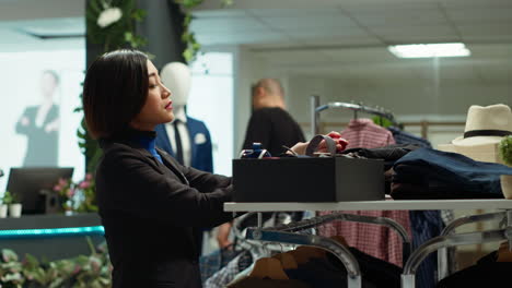 woman working in a men's fashion store