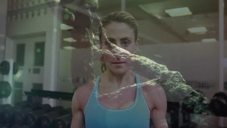 animation of dna strand spinning and data processing over strong woman exercising