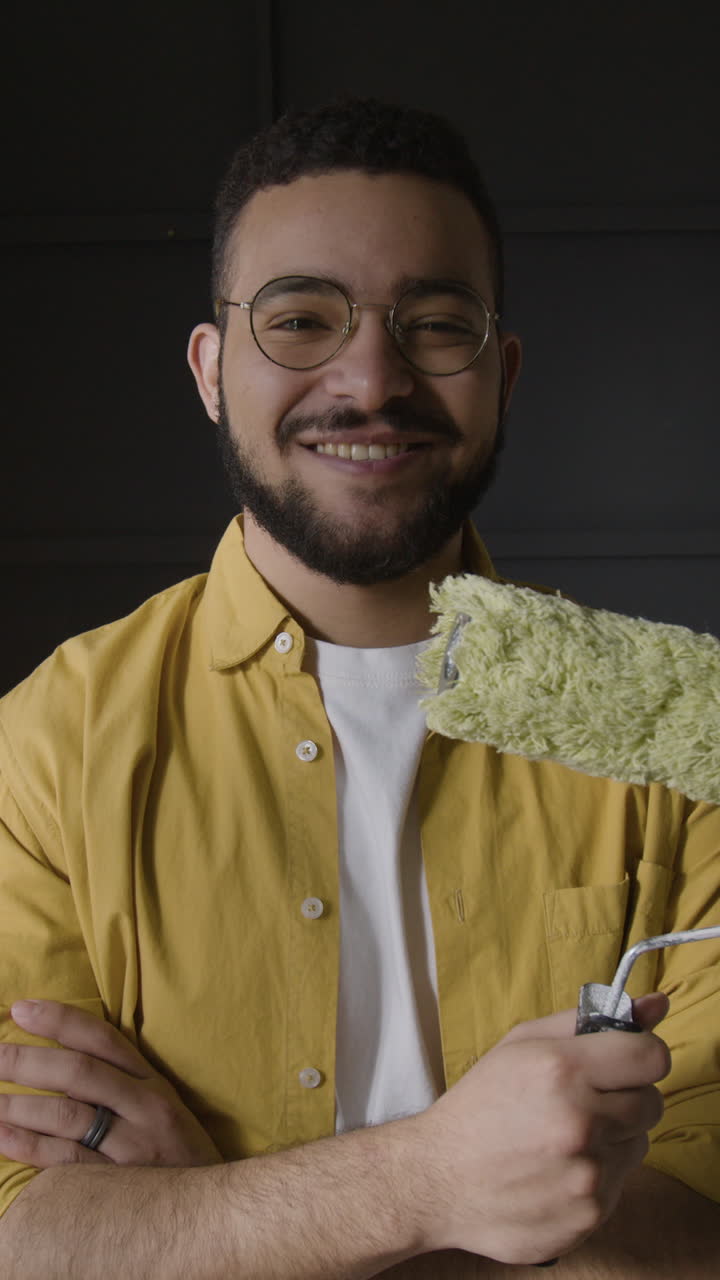 Man with paint roller