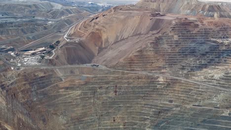 close up of bingham or kennecott copper mine then tilt up to reveal tailings and the salt lake valley below