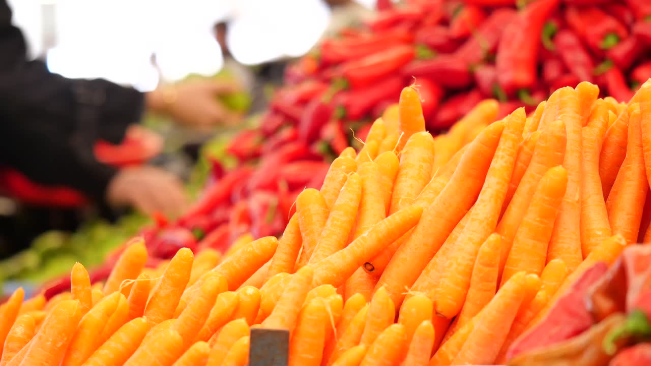 Carrots and Peppers at a Farmers Market