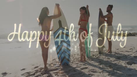 animation of 4th of july text over diverse friends with surfboards on beach in summer