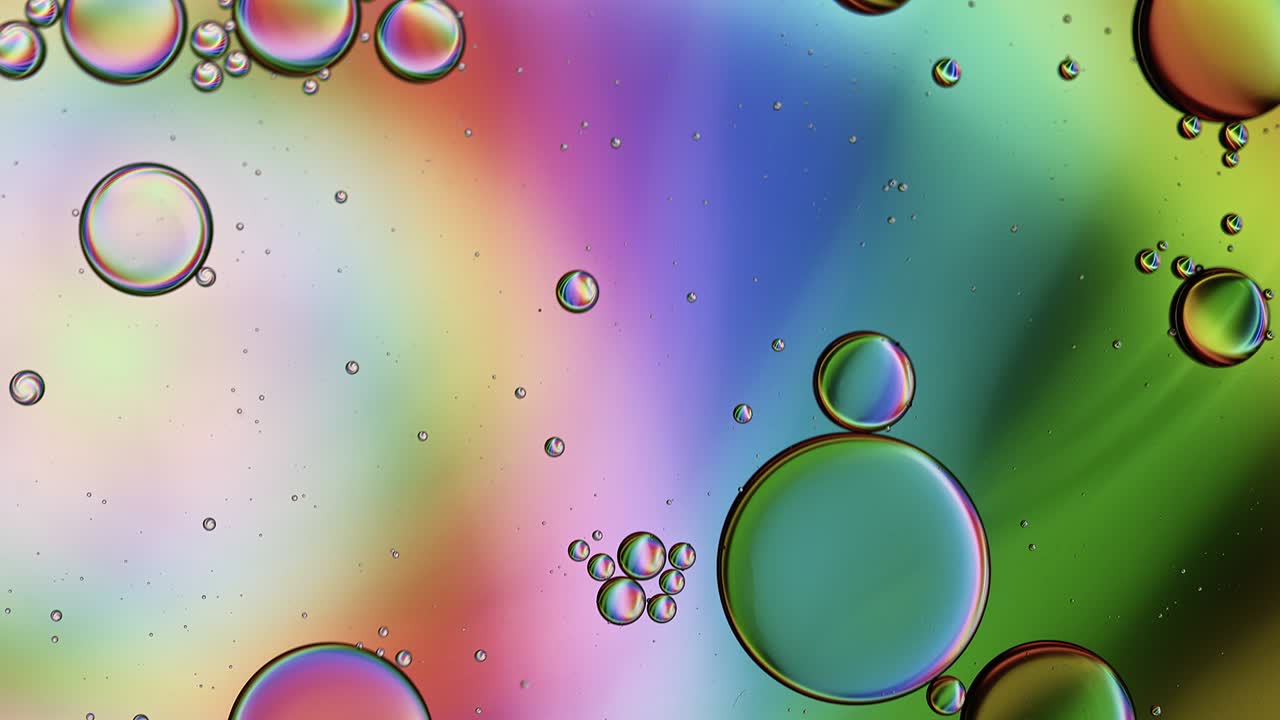 Abstract Colorful Food Oil Drops Bubbles and spheres Flowing
