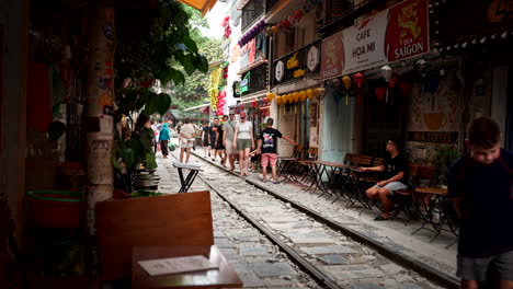 train tracks street cafe in vietnam