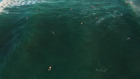 Top-down-view-of-surfers-at-Canggu