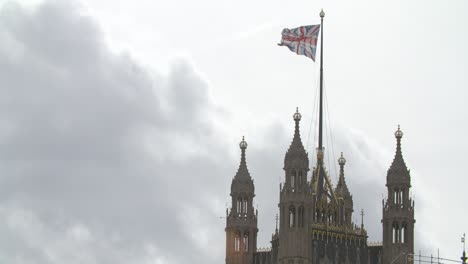 uk flag flying on westminster palace