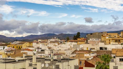 rain clouds approaching the city of malaga