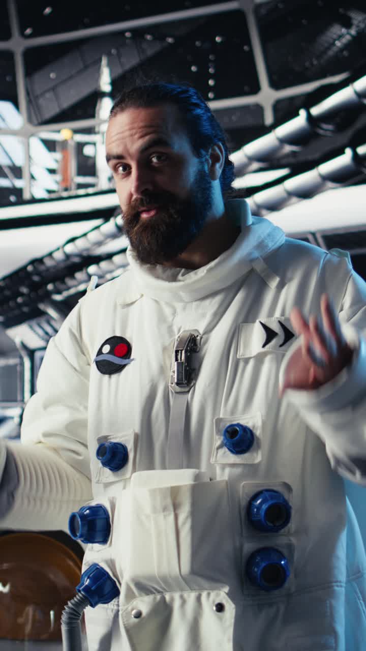 Vertical video Close up of astronaut using tablet to check logs after completing Mars mission