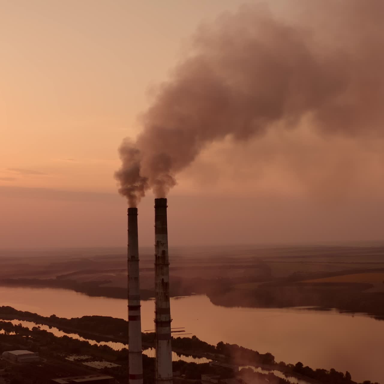 Power pylons on sunset time background. High voltage electric tower at the sunset. Fabric concept. Selective focus