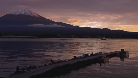 pan from sunset to mount fuji, right to left, at lake kawaguchi in japan.