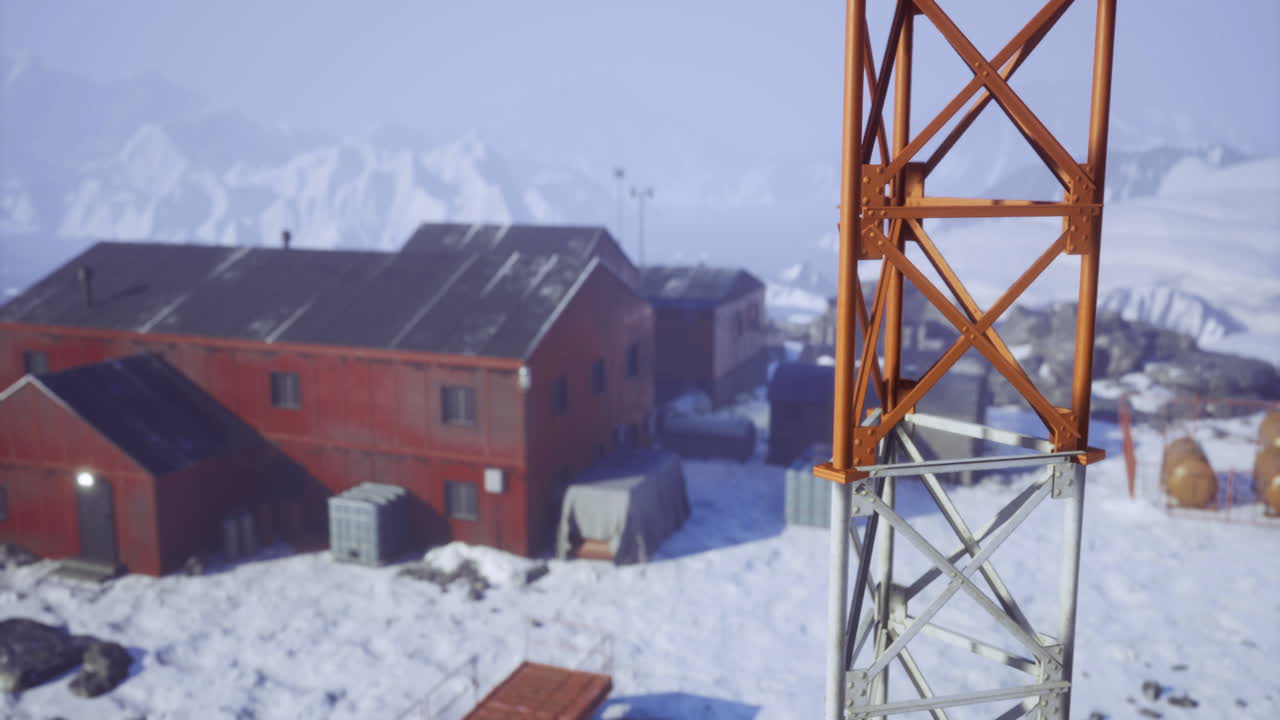 Winter landscape featuring a remote research facility in snowy surroundings