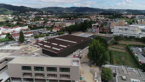 new building construction. construction workers in the roof