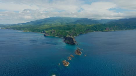 establishing aerial drone fly at shakotan hokkaido, japanese sea landscape, japan headlands in summer