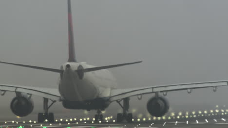 airplane landing in dense fog