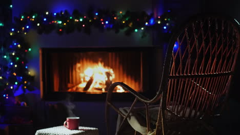 a place for tea by the fireplace - a rocking chair next to a cup of hot tea and a fireplace