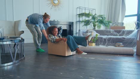 a playful afternoon of moving and laughter in a cozy new home