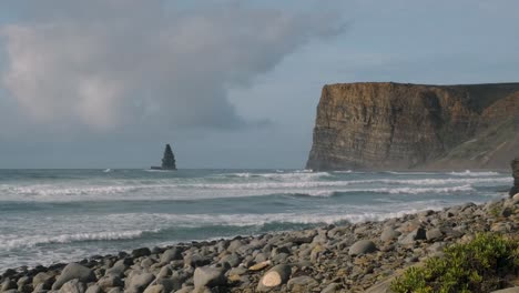 Shot-of-the-Atlantic-ocean-by-a-large-cliff-in-south-of-Portugal