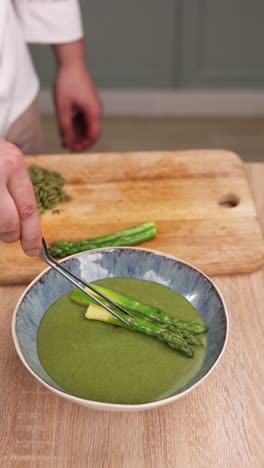 Chef preparing asparagus soup