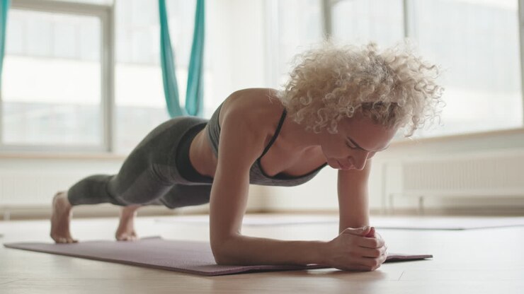 Blonde Woman Doing Plank