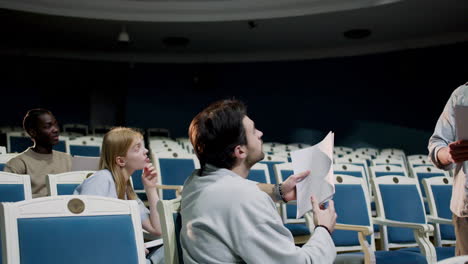 people in the theater before rehearsal