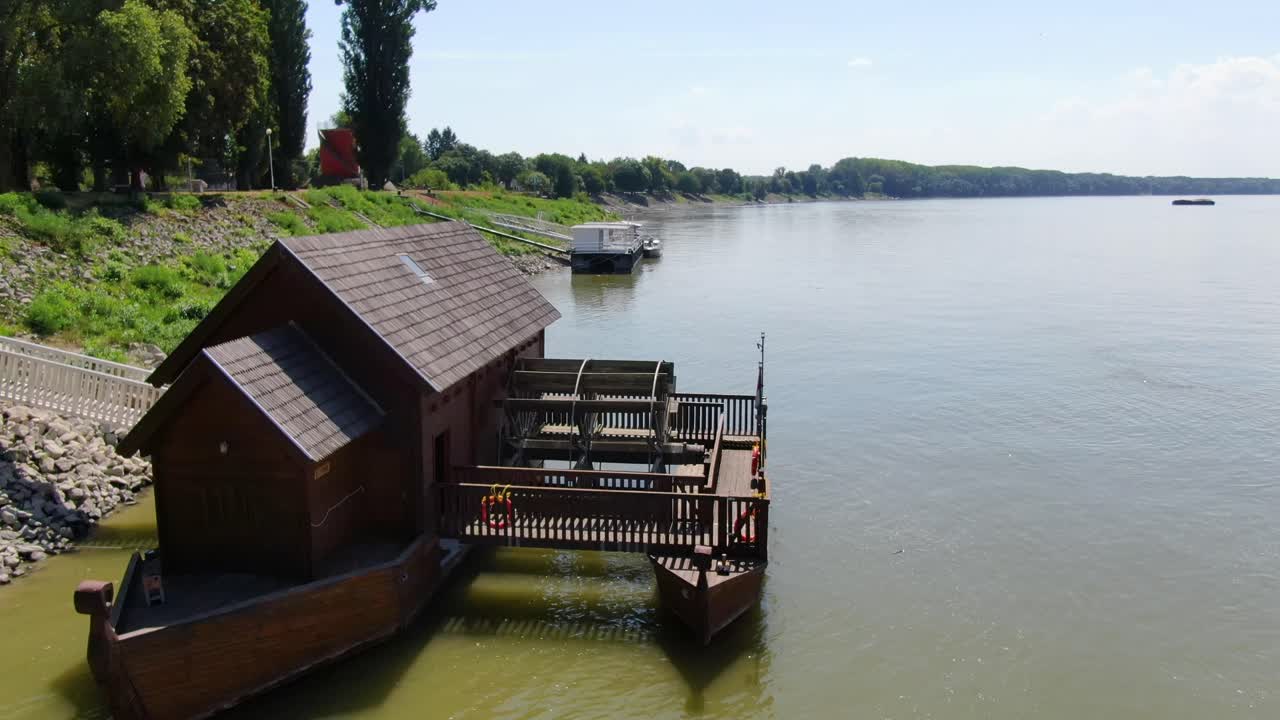Traditional Watermill boat navigating the Danube in Baja, Hungary
