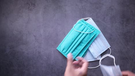 hand holding face masks