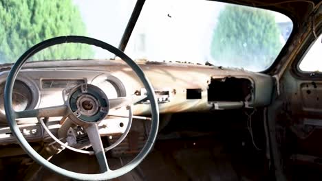 interior of a rusted out husdon coupe