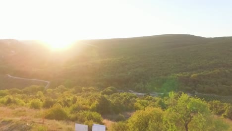 sunrise/sunset over a valley and mountains