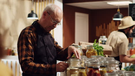 eco store vendor sealing bulk items jars