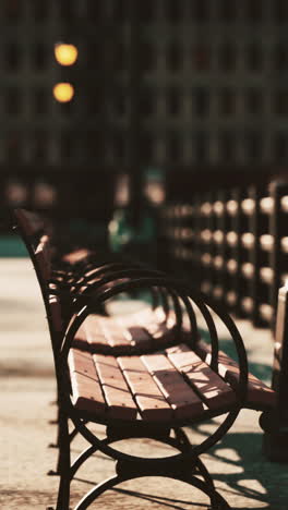 row of empty benches in the city