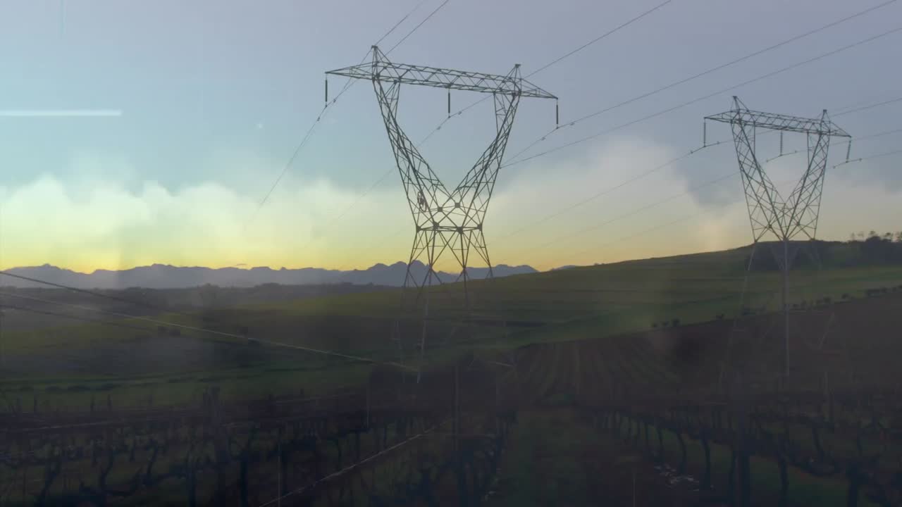 Animation of data processing over landscape with electricity pylons