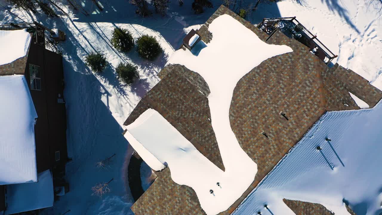 Winter Neighborhood Houses Covered in Snow in Pine Tree Forest, Top Down Drone View in Breckenridge Colorado Mountain Town Cul-de-sac With Rustic Vacation Homes, Aerial Bird's Eye View
