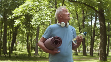 senior man exercising in park