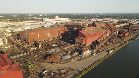 Rusty-old-buildings-of-Ford-Rogue-river-Complex,-aerial-drone-view