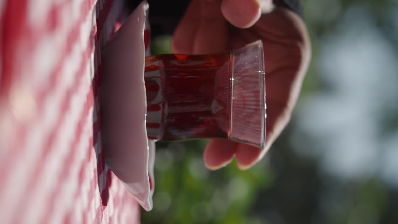 Turkish tea on a red and white checkered tablecloth